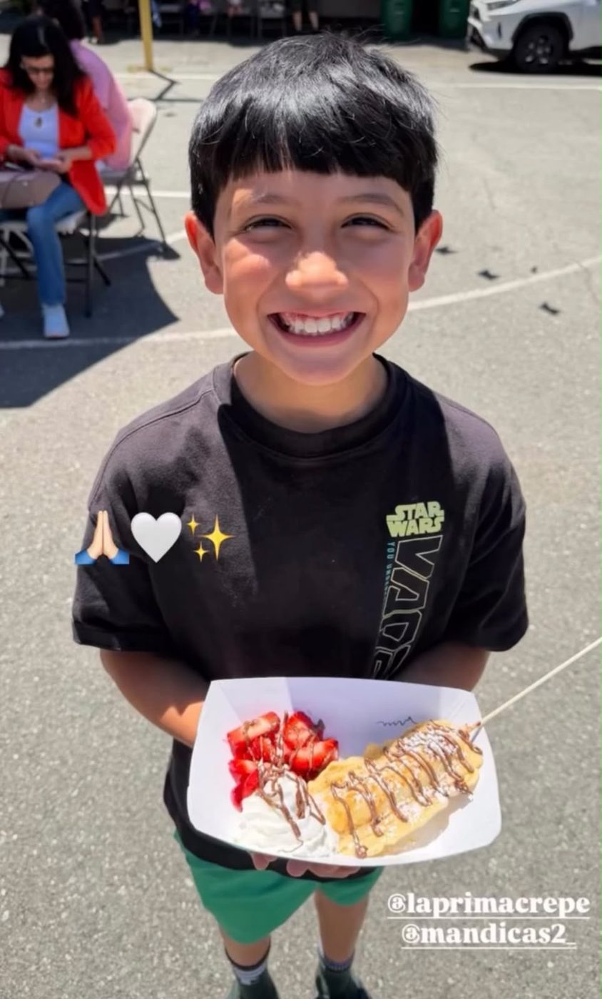 Guest enjoying a crepe at the event